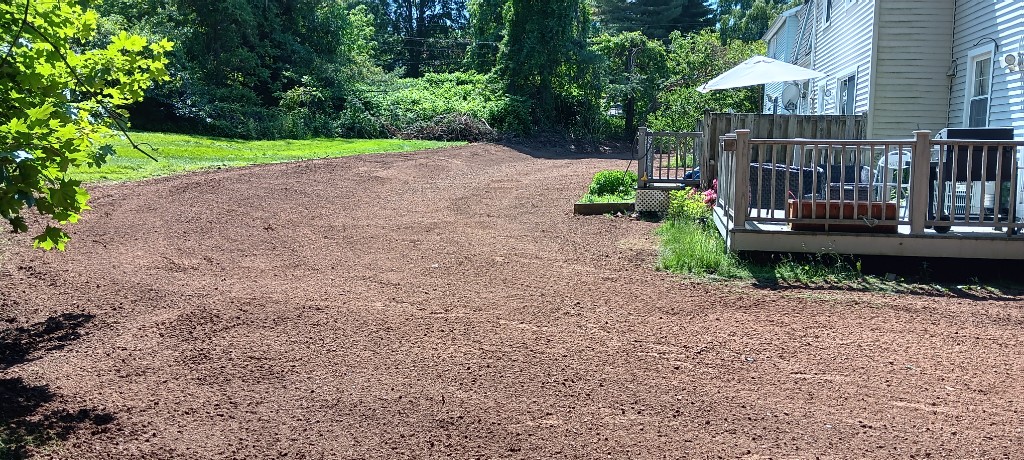 Grading and seeding after excavation in Connecticut