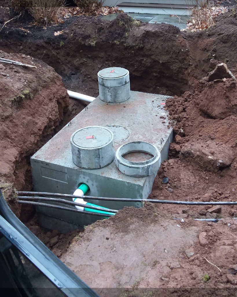 Sewer main and septic tank excavation in Wallingford, CT